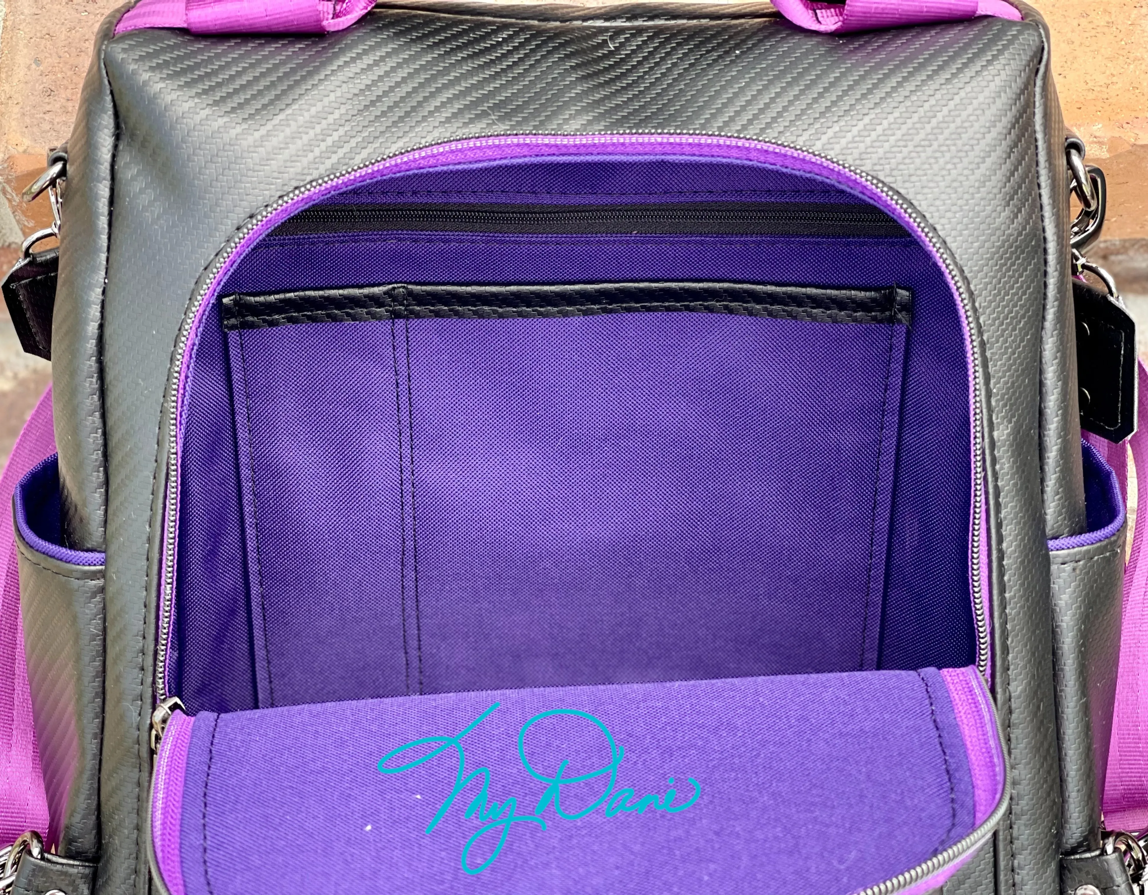 The Guardian Anti-Theft Backpack in Black Textured Marine Vinyl w/purple lining
