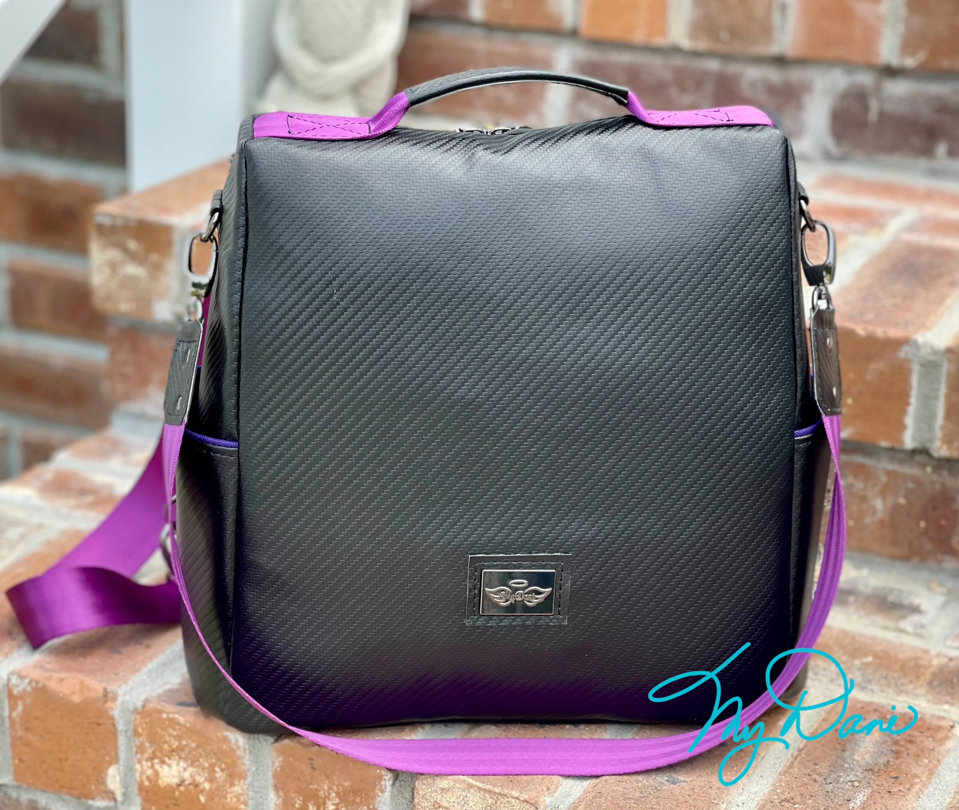 The Guardian Anti-Theft Backpack in Black Textured Marine Vinyl w/purple lining